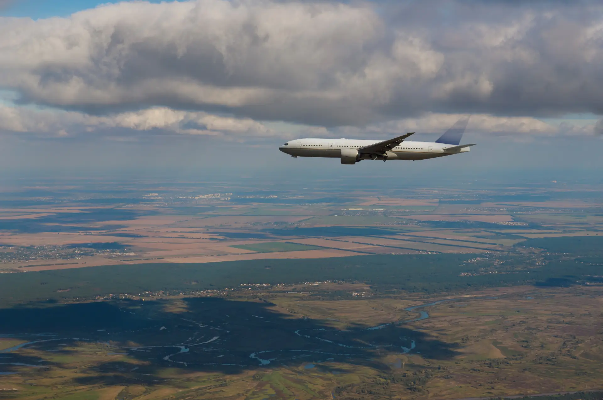 airplane-flying-above-away-in-the-sky-the-view-of-2023-11-27-05-04-01-utc